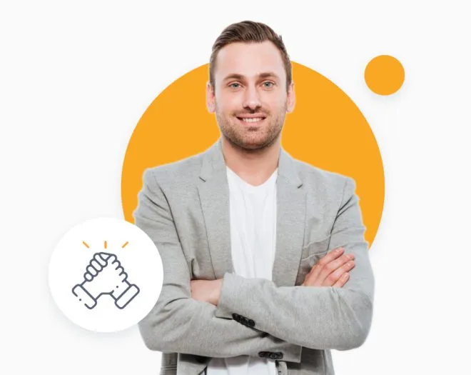 A man in a grey suit in front of an orange circle.