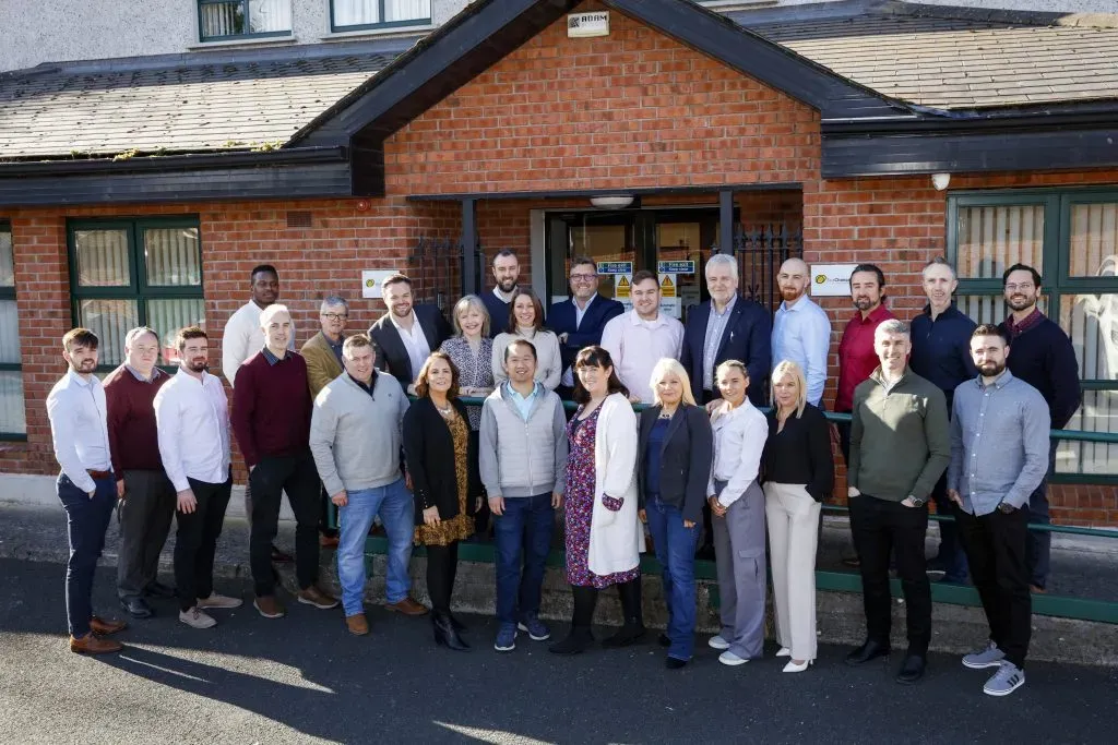 SeaChange employees posing outside of the office.