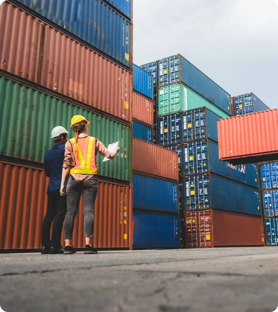 Woman looking at shipping containers.
