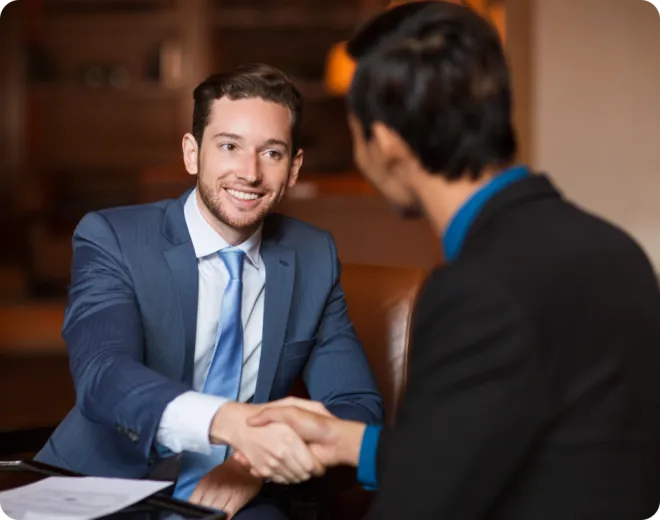Business men shaking hands.