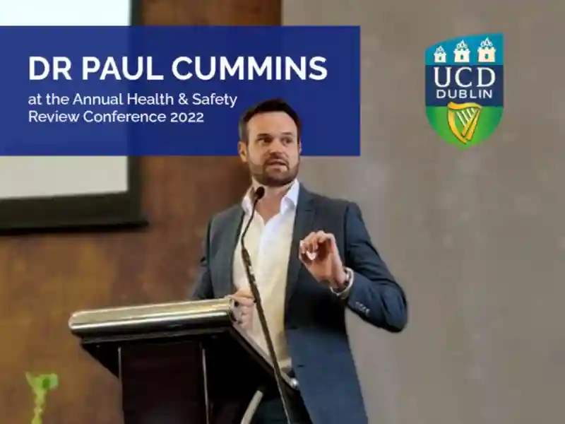 Dr. Paul Cummins speaking at an event.