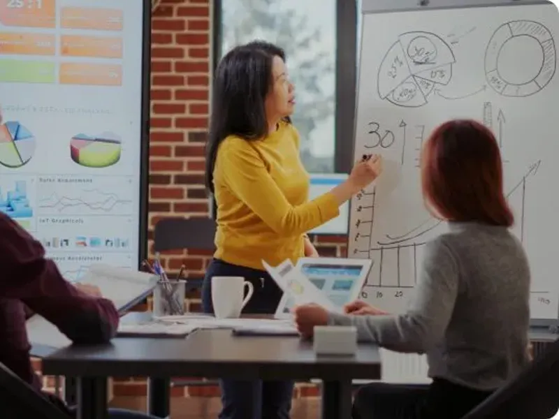 A professor teaching a finance class to adults.