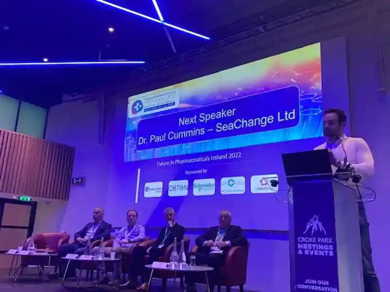 Dr. Paul Cummins speaking at an event.