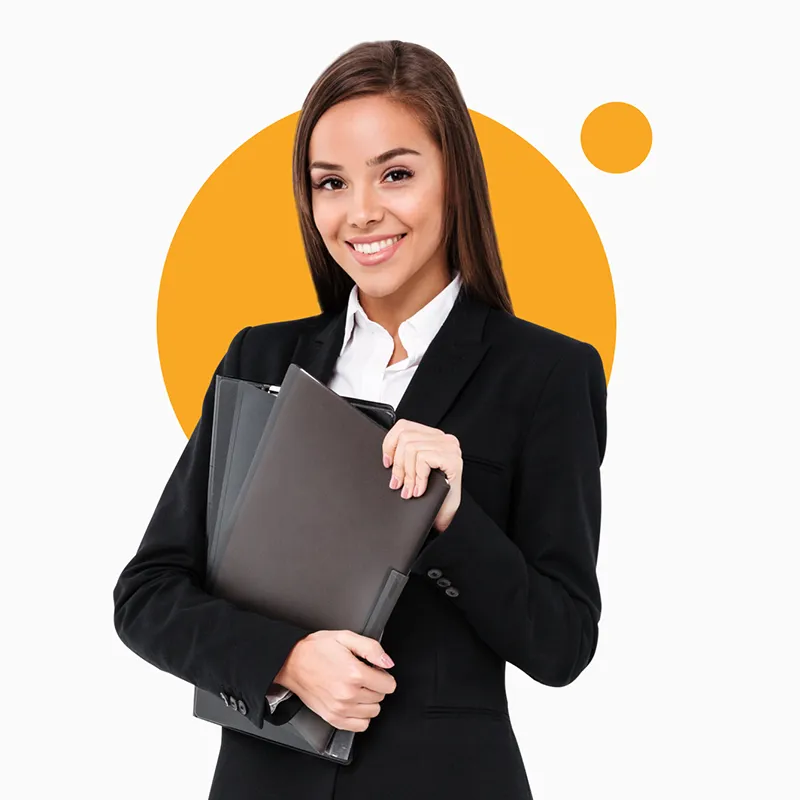 Woman smiling in a black blazer.